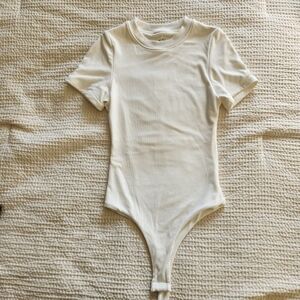 Klassy Network Ivory Bodysuit